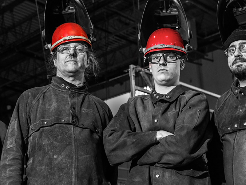 men in welding equipment
