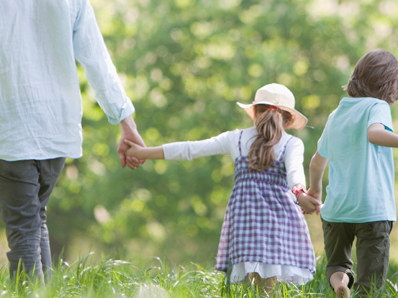 family walking in field